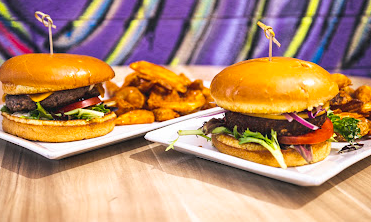 Local Jonny's Tavern & Café signature dishes Blue Burger
Herb Marinated Chicken
Buttered Noodles